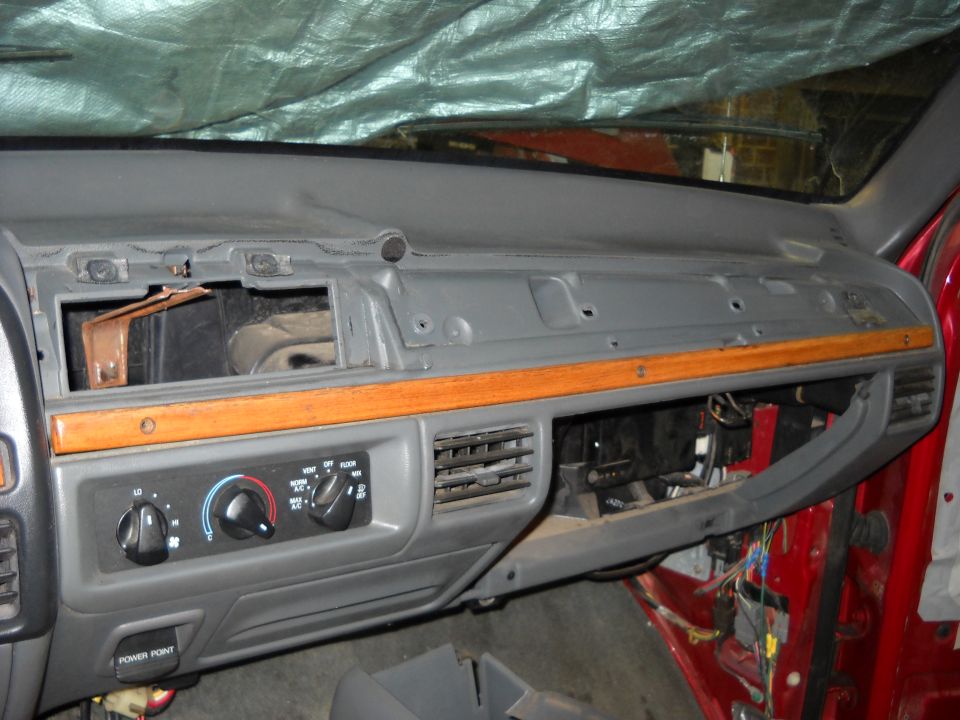 1993 Ford C-150 (Centurion Conversions) dashboard with open glove box and exposed wiring