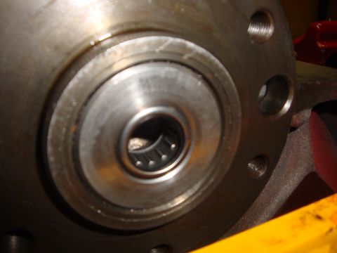 1989 Ford Bronco - Close-up view of a wheel bearing assembly, likely part of an engine rebuild.