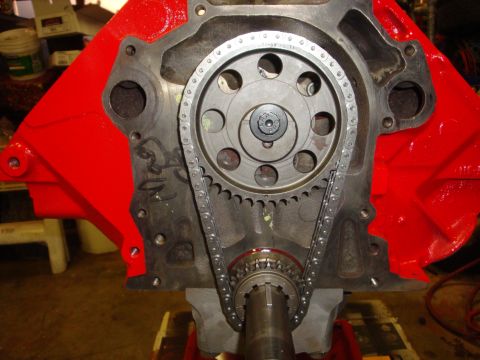1989 Ford Bronco - The internal components of an engine, specifically the timing chain and gears, are visible in this close-up shot.