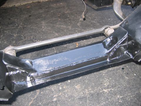 1971 Ford Ranchero - A close-up view of a vehicle's suspension component, likely part of the steering or frame.