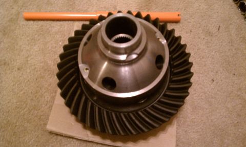 1990 Ford Bronco - Differential gear set shown with an orange tool in the background.