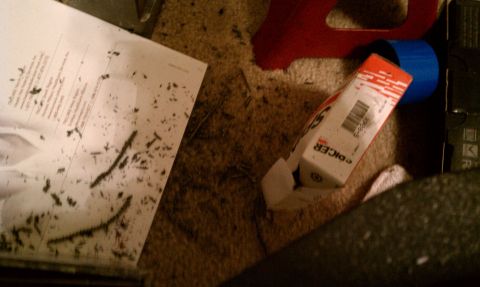 1990 Ford Bronco - A box labeled 'SPICER' and some scattered paperwork are visible on a carpeted surface.