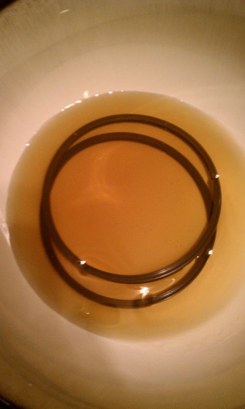 1990 Ford Bronco - Piston rings soaking in oil, with a "SUPERMOTORS.NET" watermark visible.