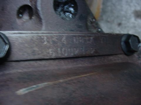1992 Ford Bronco - Close-up of a metal part with stamped identification numbers.
