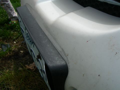 1984 Ford Bronco - Deflection in the bumper from the hit. Really screwed up my 200k mile paint.