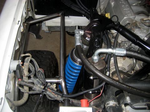 1996 Ford Bronco - Custom suspension and engine components are visible in this close-up view of a modified vehicle.