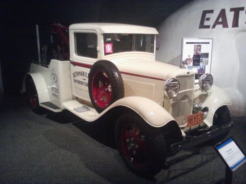 1995 Ford Taurus - A vintage tow truck is displayed at the Peterson Automotive Museum.