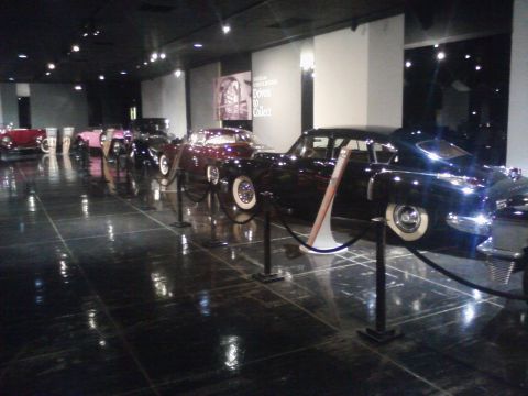 1995 Ford Taurus - Museum exhibit a row of vintage automobiles on display.
