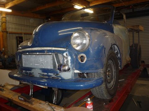 1969 MINI Cooper - This Morris Minor convertible project car is undergoing modifications in a workshop.
