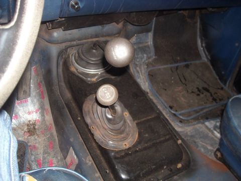 1979 Ford Bronco - The interior of this 1979 Ford Bronco shows the dual gear shifters and part of the dashboard.