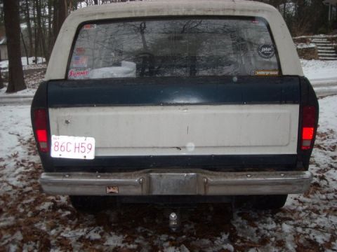 1979 Ford Bronco - The rear of a 1978 Ford Bronco shows its two-tone paint scheme and a chrome bumper.