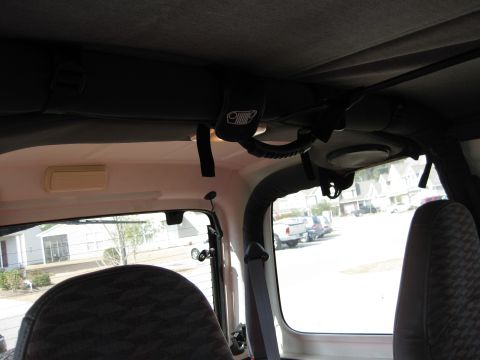 1998 Jeep Wrangler - Interior view of a Jeep, showing the grab handle and overhead console.