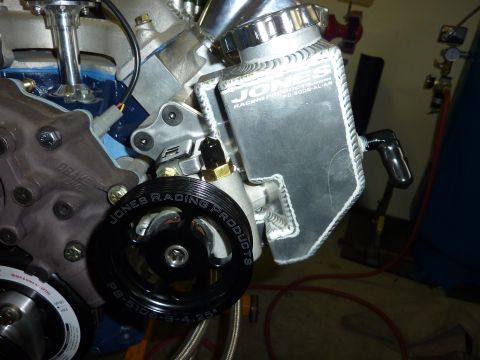 1971 Ford Mustang - This image shows a close-up of engine parts, a Jones Racing Products pulley and a polished aluminum reservoir.
