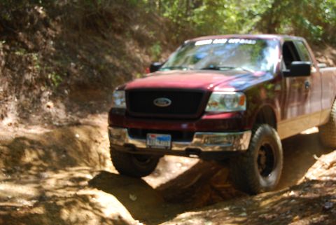 2005 Ford F-150 - This 2005 Ford F-150 is navigating a challenging off-road trail.