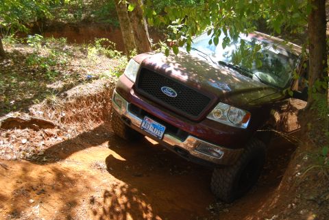 2005 Ford F-150 - This Ford F-150 is navigating a challenging off-road trail.
