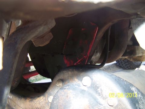 1995 Ford Bronco - Undercarriage detail with visible suspension parts and exhaust system. Date stamp present.