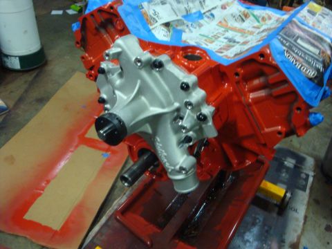 1989 Ford Bronco - A freshly painted engine block and water pump are ready for assembly.