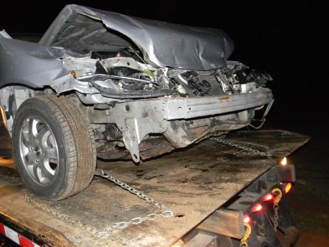 1975 Ford Ranchero - This car sustained heavy front-end damage and is being towed.