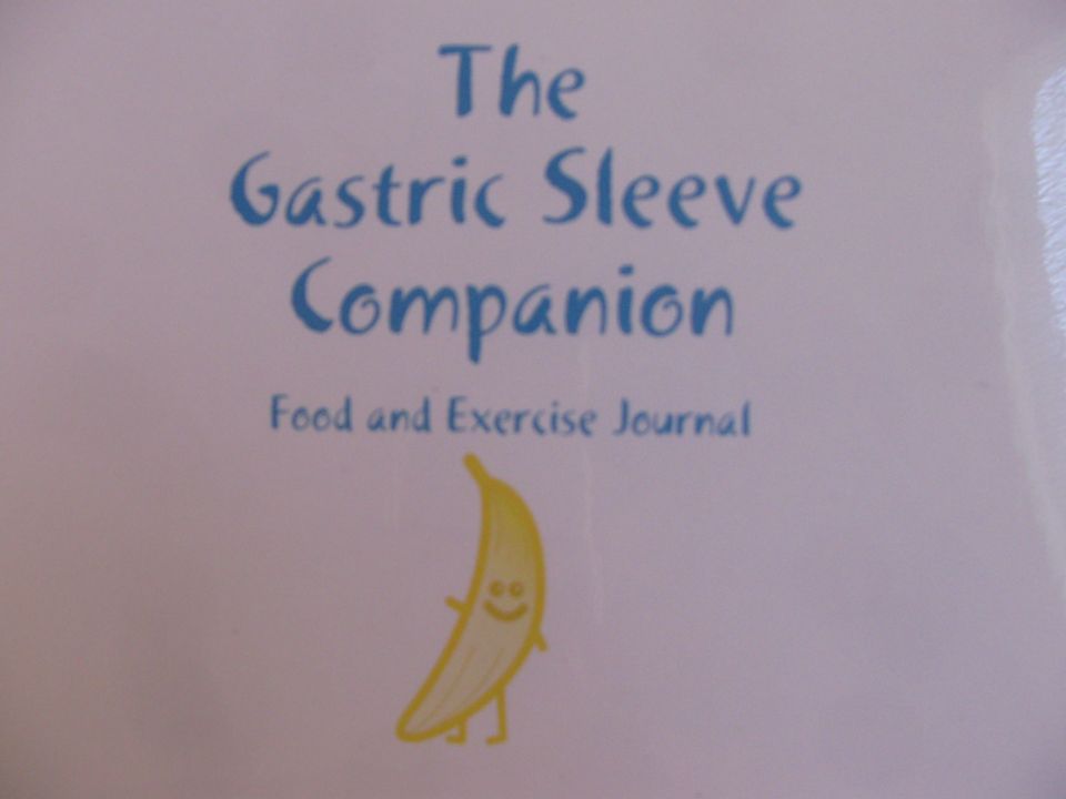 Close-up of The Gastric Sleeve Companion journal cover with a banana cartoon