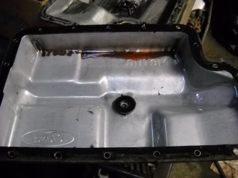 1993 Ford C-150 (Centurion Conversions) - Ford transmission pan, likely from an E4OD rebuild project.