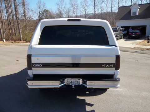 1995 Ford Bronco - This 1995 Ford Bronco is shown from the rear, its 4x4 badging and a Tennessee license plate.
