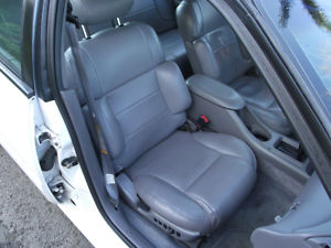 1993 Ford Taurus - Interior view of a car's front passenger seat and dashboard area.