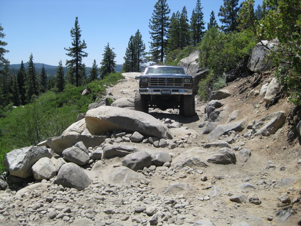 1980s Ford F-Series truck on rocky trail