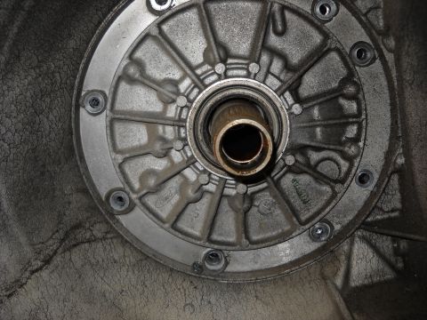 1993 Ford C-150 (Centurion Conversions) - A Ford transmission pump housing is shown in a close-up view, revealing internal components and casting marks.