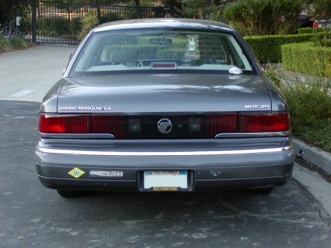 1992 Mercury Grand Marquis - Rear view of a 1992 Mercury Grand Marquis GS sedan parked outdoors.