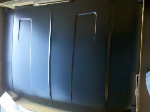 1995 Ford Bronco - The hood of a 1995 Ford Bronco is shown, likely for replacement or repair.