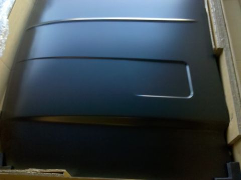 1995 Ford Bronco - A car hood is shown inside its packaging, ready for shipping or storage.