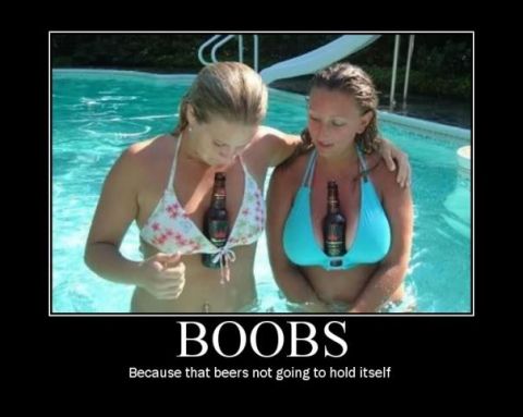 1988 Ford Bronco - Two women are in a swimming pool, each holding a beer bottle between their breasts.