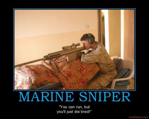 1988 Ford Bronco - A Marine sniper is positioned to take a shot while lying on a bed.