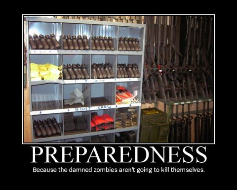 1988 Ford Bronco - A collection of firearms and ammunition is organized and stored, ready for use.