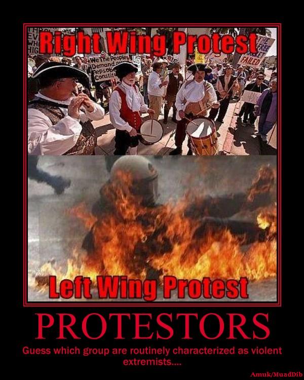 Protestors in historical costumes play instruments above a person engulfed in flames