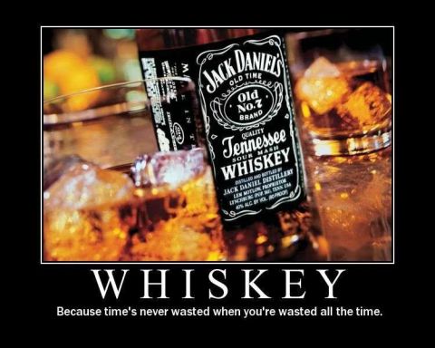 1988 Ford Bronco - A bottle of Jack Daniel's whiskey sits with glasses filled with ice and the amber liquid.