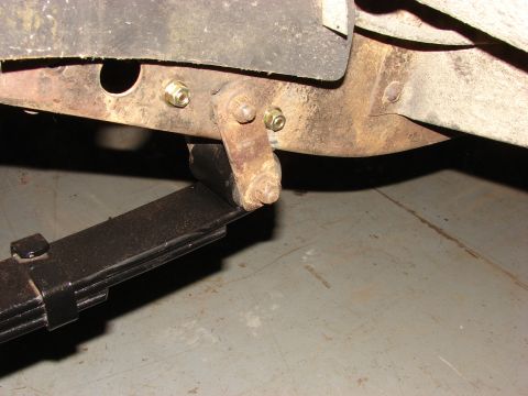 1971 International School Bus - This photo shows a close-up of a vehicle's leaf spring suspension system.