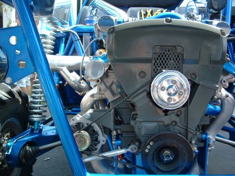 1993 Ford Taurus - Engine and suspension details of a custom build, polished metal and blue tubing.