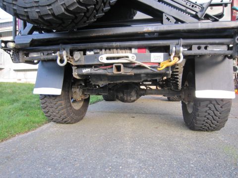 1996 Ford Bronco - Vehicle's rear suspension, winch, and tow hitch are visible in this photo.