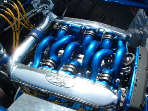1993 Ford Taurus - Customized engine components with a prominent Ford logo are visible in this engine bay.