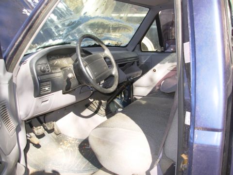 1995 Ford F-150 - A squirrell wintered under the seat - he's been getting in & out through the dislodged shifter cable blockoff plug forward of the gas pedal…