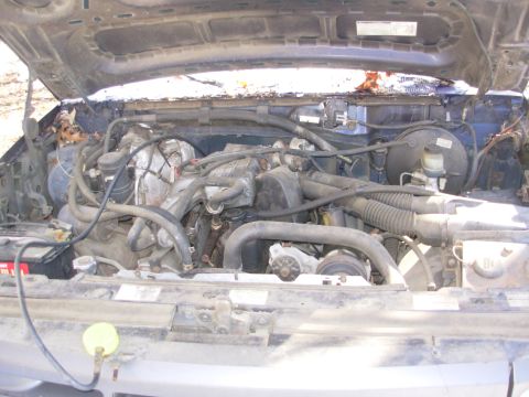 1995 Ford F-150 - The previous owner got as far as bending a tie-rod by hooking a tow chain there, connecting a fuel pressure gauge, & disconnecting one plug…