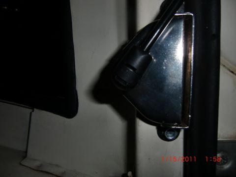1973 Ford Bronco - Close-up view of a vehicle's interior door latch mechanism.