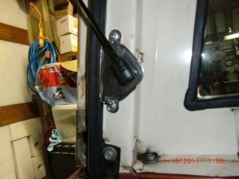1973 Ford Bronco - Door latch mechanism detail, with visible date stamp and website watermark.