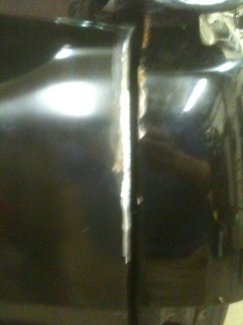 1993 Ford Bronco - Detail of a tailgate seam, showing the join between two body panels.