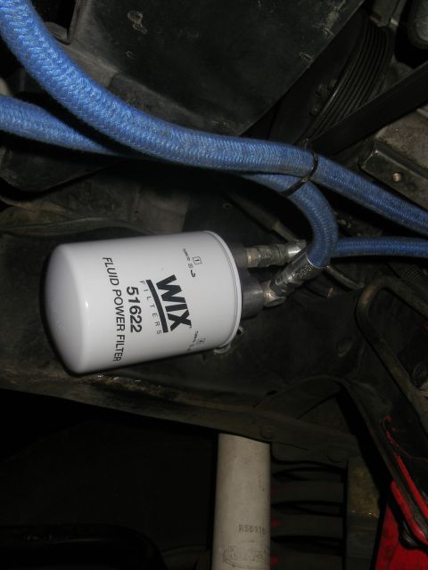 1990 Ford Bronco - A WIX 51622 fluid power filter is visible, connected by blue braided hoses.