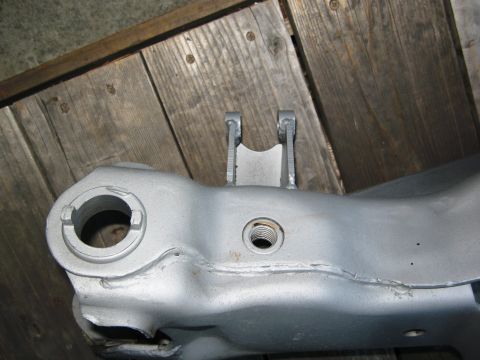 1986 Ford Bronco - This is a close-up of a suspension beam part, likely from a vehicle's front end.