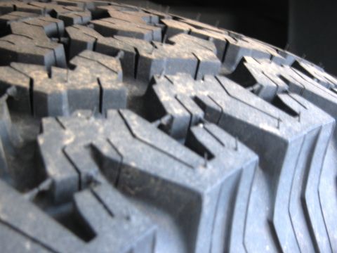 1986 Ford Bronco - This image shows a close-up of an off-road tire tread, not a 1986 Ford Bronco.