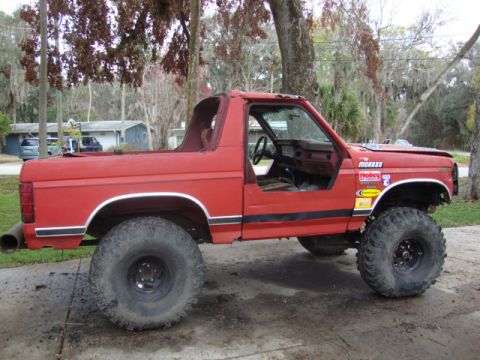 1986 Ford Bronco - This modified SUV has a lifted suspension and oversized tires.