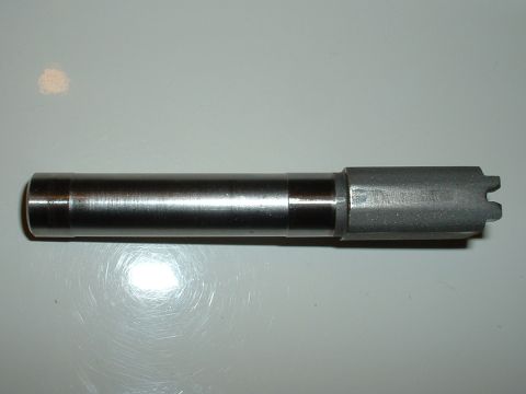 1989 Ford Bronco - Metal part with a cylindrical shaft and a shaped end, possibly a pin or shaft.